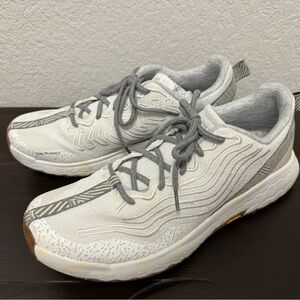 Men’s New Balance trail running shoes, size 14.
